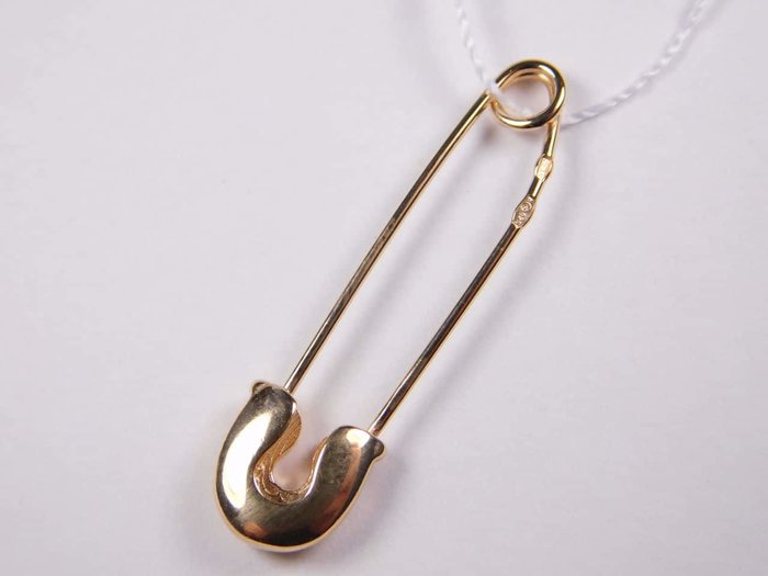 Золотая булавка